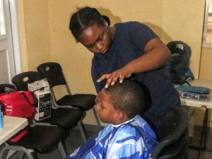 Free haircuts give students a sharp start to the new school term