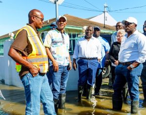 PM Davis and DPM Cooper along with Cabinet Colleagues on the ground assessing flooding following the passage of Tropical Storm Imelda