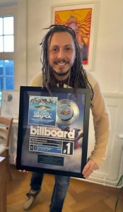 Swiss reggae artiste Cookie the Herbalist receives Billboard plaque
