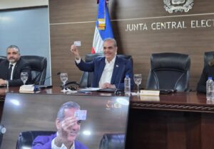 JCE delivers first new identity and electoral card to President Abinader