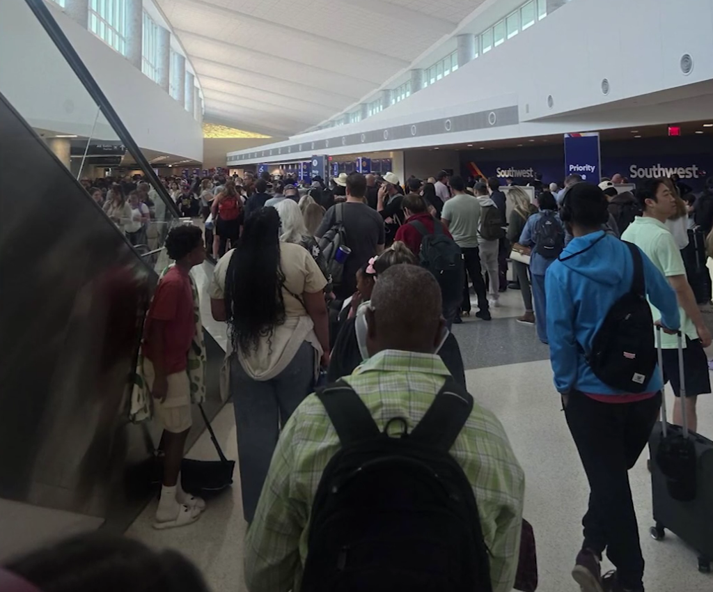 US airports see long delays due to shutdown-linked staff shortages US airports see long delays due to shutdown-linked staff shortages